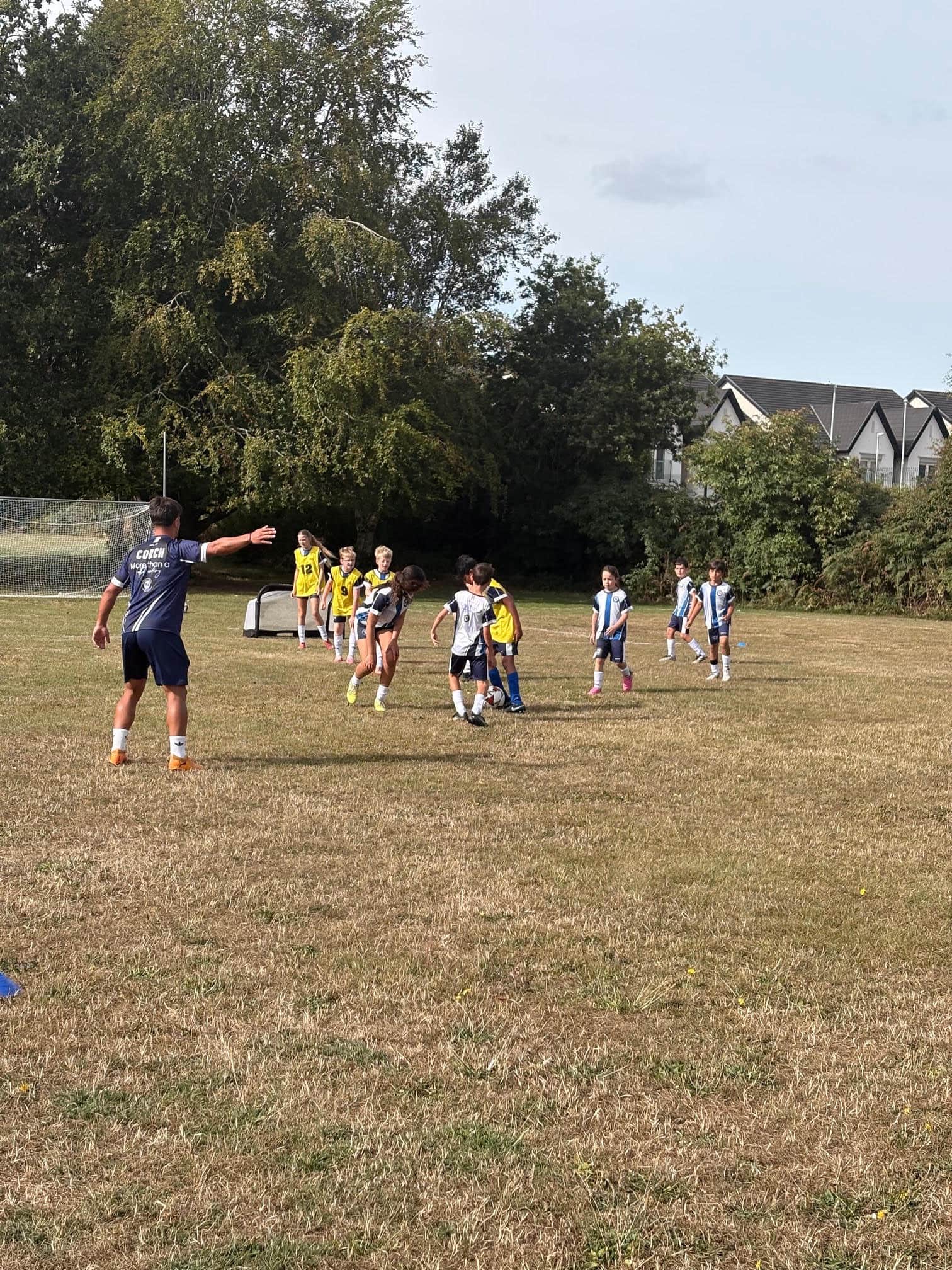 M&A Football Academy players training on the pitch
